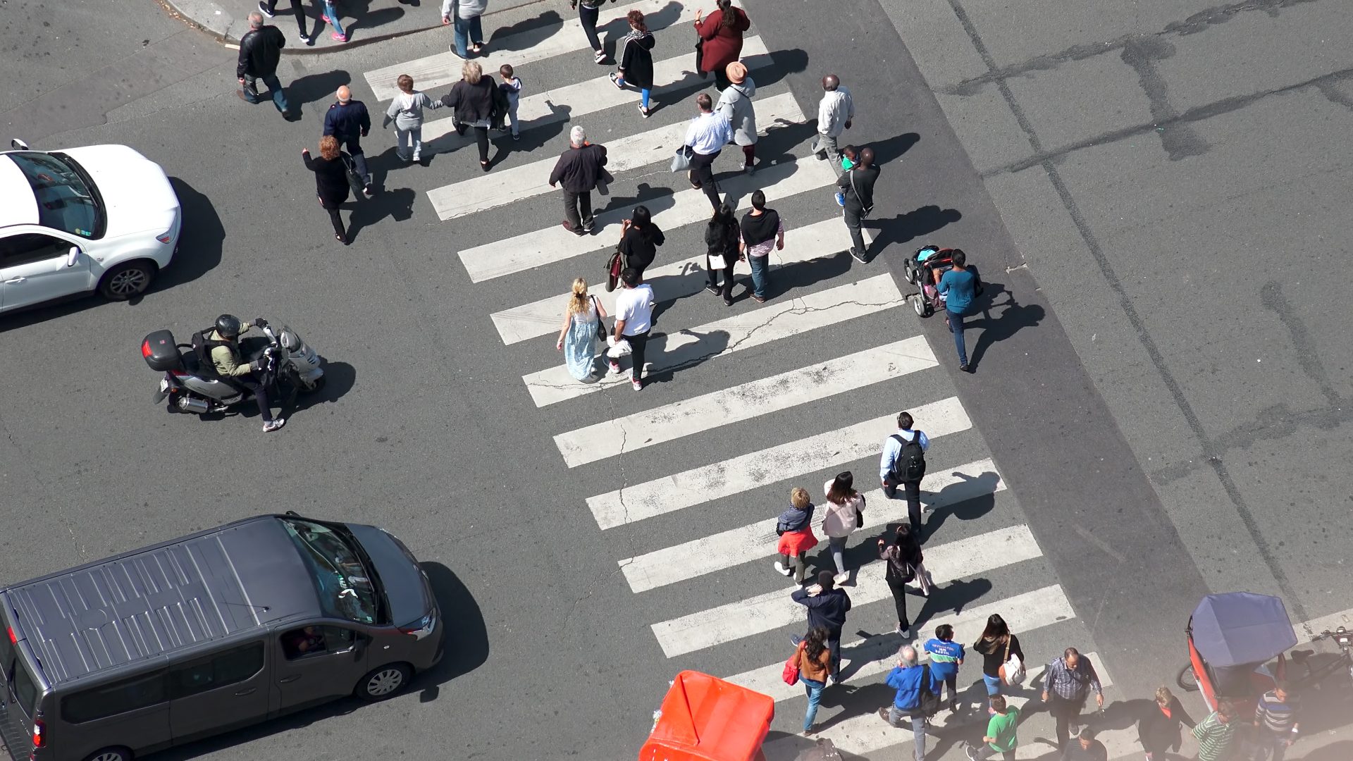 Paris, France – circa May, 2017: Aerial view of pedestrian crossing on street in Paris next to Eiffel Tower